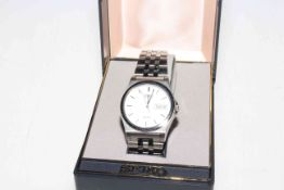 Seiko SQ100 gents watch and DKNY ladies watch,