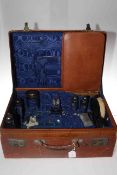 Gents travelling case with silver topped jars and another