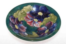 Moorcroft Pottery bowl decorated with clematis on green ground
