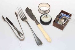 Silver butter knife, napkin ring, tongs, fork, 9 carat gold ring, medallion,