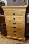 Light oak chest of six drawers,