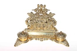 Ornate cast brass desk stand