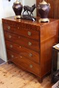 Georgian mahogany and string inlaid chest of four long graduated drawers on bracket feet,