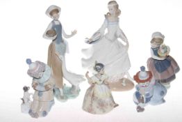 Collection of six pieces of Lladro including two clowns and four figures