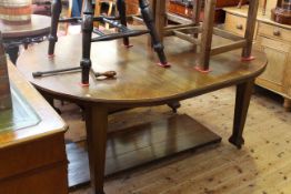 Early 20th Century oak extending dining table, leaf and winder bearing label for Ralph Johnson,