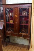 Edwardian inlaid mahogany china cabinet having two glazed panel doors above two drawers on square