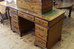 Crossbanded mahogany nine drawer pedestal desk bearing label for Adam Richwood, London,