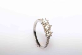 18 carat gold three-stone diamond ring,