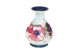 Moorcroft Pottery vase decorated with anemone on blue ground
