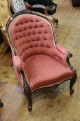 Victorian mahogany framed armchair with serpentine front seat in buttoned fabric