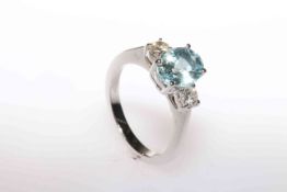 18 carat gold, aquamarine and round brilliant diamond three-stone ring,
