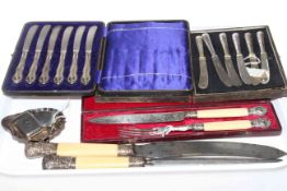 Two silver vesta cases, shell dish, two sets of tea knives, carver and steel,