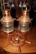 Pair of copper ships anchor lights and mahogany and brass ships wheel