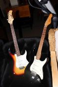Two electric guitars by Encore and Zennox