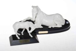 Two Beswick white horses on plinths 'Sunlight' and 'Spirit of Peace'