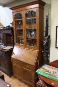 Arts & Crafts inlaid oak bureau bookcase having two leaded glass doors above a fall front with two
