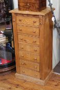 Pine Wellington chest of seven drawers,