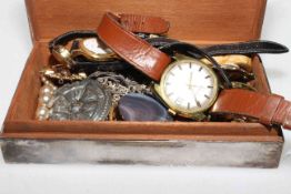 Silver cigarette box with watches and jewellery