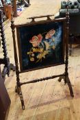 Mahogany turned pillar firescreen with floral needlework panel
