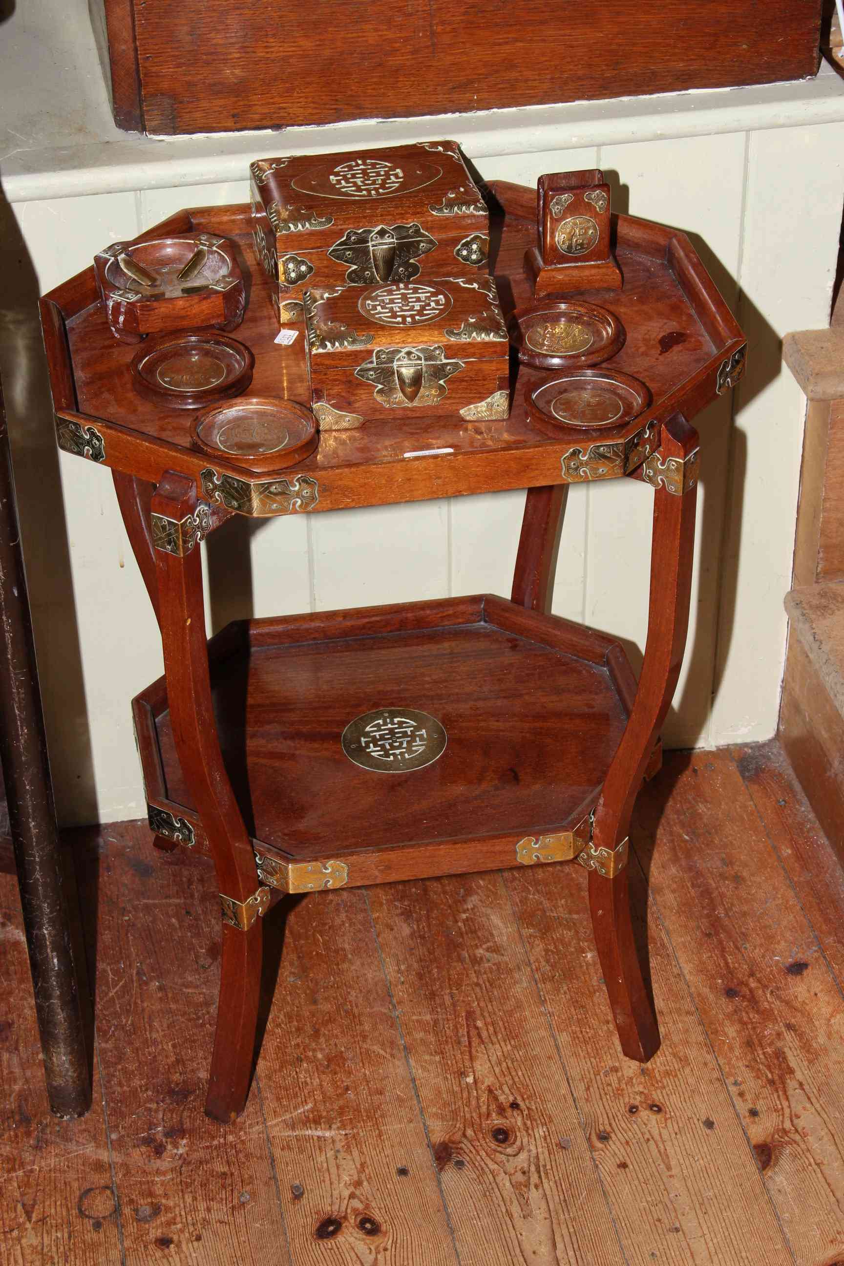 Eastern mahogany and brass inlaid occasional table, two jewel boxes, ashtray,