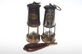 Two miners lamps and leather powder flask (3)