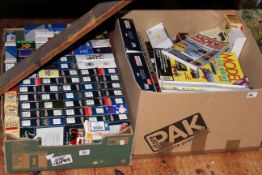 Two boxes of model vehicles, including Lledo and Vanguard, model price guides,