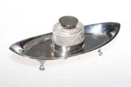 Silver boat shaped desk stand with single inkwell