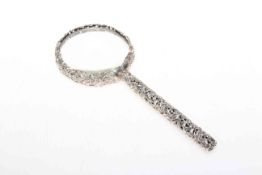 Ornate silver magnifying glass