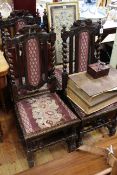 Set of four Victorian carved oak and twist pillar dining chairs