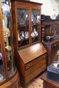 Edwardian inlaid mahogany bureau bookcase having two astragal glazed doors above a fall front with