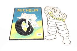 Two cast metal Michelin signs