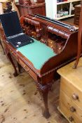 Mahogany Chippendale style two drawer writing table on ball and claw leg having leather writing