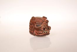A JAPANESE CARVED WOOD MASK NETSUKE, with pinned jaw.