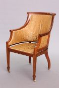 AN EDWARDIAN INLAID MAHOGANY BERGERE, CIRCA 1910, the out-scrolled arms with satinwood inlaid bands,