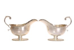 A PAIR OF SILVER SAUCE BOATS, S. Blanckensee & Sons Ltd, Birmingham 1945, each with oval foot.