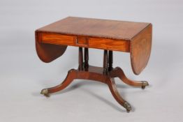 A GEORGE IV MAHOGANY AND ROSEWOOD SOFA TABLE, the well figured top with bead and reel edge,