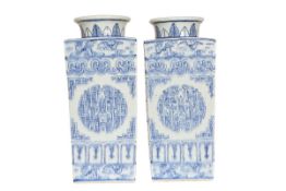 A PAIR OF CHINESE BLUE AND WHITE SQUARE SECTION VASES,