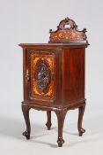 A GOOD VICTORIAN FLORAL INLAID MAHOGANY POT CUPBOARD, with C-scroll carved back and carved door,