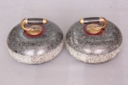 TWO CURLING STONES,