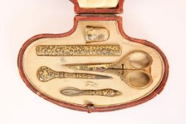 A LEATHER CASED NECESSAIRE, 19TH CENTURY AND LATER, comprising three 22 carat gold damascened items,