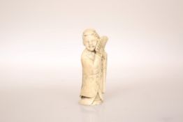 A JAPANESE IVORY FIGURAL NETSUKE, carved as a bijin holding a fan in front of her face,