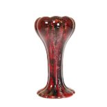 A ROYAL DOULTON FLAMBE TULIP FORM VASE, the glaze a mottled amethyst over red, shape 920,
