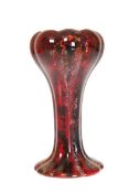 A ROYAL DOULTON FLAMBE TULIP FORM VASE, the glaze a mottled amethyst over red, shape 920,