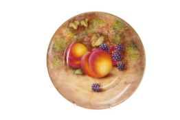 A ROYAL WORCESTER FRUIT PAINTED PLATE, painted by Freeman, decorated with peaches and blackcurrants,