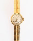 A LADY'S 18 CARAT GOLD ROLEX WATCH, with circular case and dial,