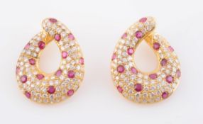 A PAIR OF DIAMOND AND RUBY EARRINGS BY ADLER,