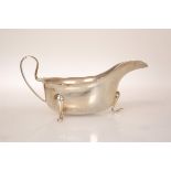 A GEORGE V SILVER SAUCE BOAT, Emil Viner, Sheffield 1931, with pad feet. 4.2oz, 14.