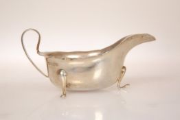 A GEORGE V SILVER SAUCE BOAT, Emil Viner, Sheffield 1931, with pad feet. 4.2oz, 14.