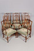 A SET OF EIGHT SHERATON STYLE MAHOGANY DINING CHAIRS, including a pair of carvers,