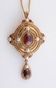 A GARNET AND SEED PEARL BROOCH PENDANT,